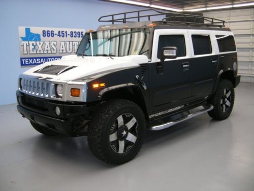 We finance!!  2007 hummer h2 4x4 custom paint heated leather bose tvs texas auto