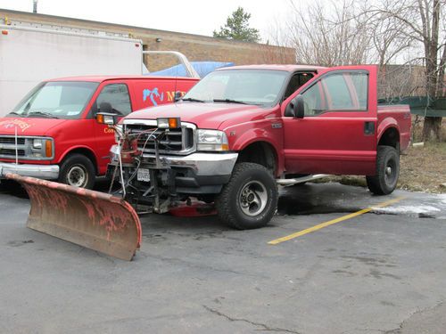 //02 lariat super duty 4x4 with plow orig.96,000miles  lifted perfect condi.