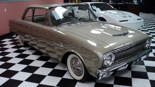 This is a fully restored beautiful little 1962 ford falcon