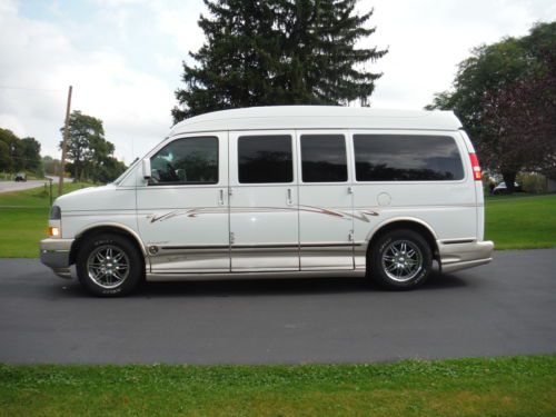 Hi-top 2009 gmc savana 1500 custom conversion van