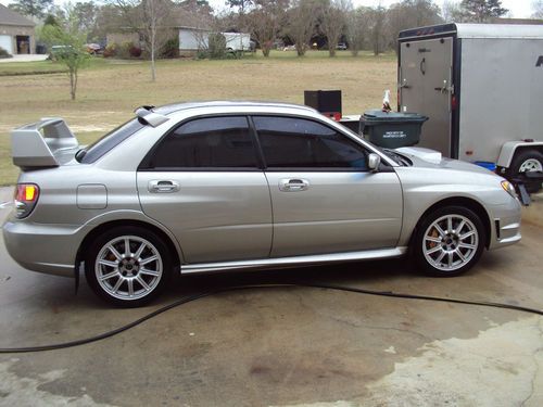 06 subaru wrx sti awd ..protuned ....extras