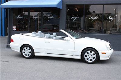 Convertible,white/ash/ new ash top,64k miles,long term financing,trades accpeted