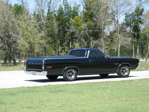 '69 ranchero. black very good paint. original bone stock rebuild. no rust. none.