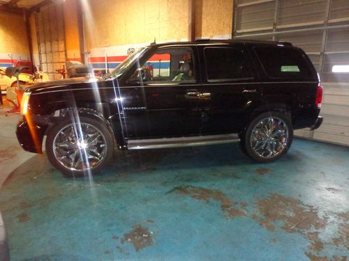 2004 cadillac escalade with 26" leaxari rims must see!!!
