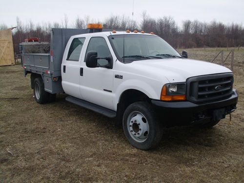 1999 ford f450 powersrtoke diesel 4 door with tommy lift gate runs great