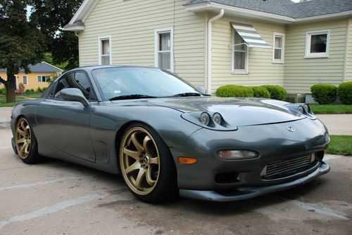 1994 mazda rx-7  very fun to drive, and very fast.