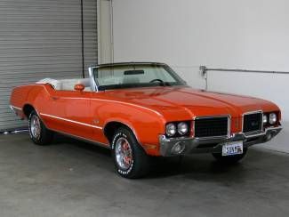 350 c.i. v8, auto trans, flame orange, very original 72 olds cutlass!