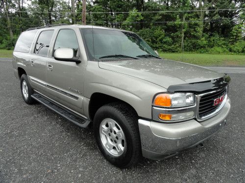 2003 gmc yukon xl 9 pass.  rear entertainment