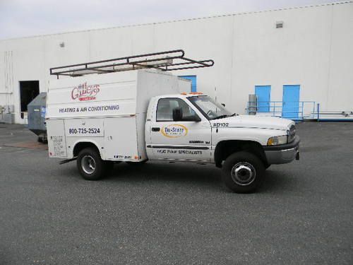 2001 dodge white 3500 ram good condition dual rear wheels utility body lift gate