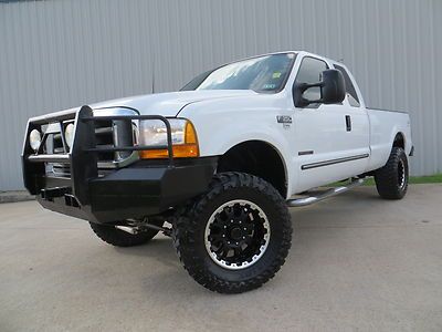 00 f350 (7.3) power-stroke (6spd) lifted mbrp 35s intake bumpers 1-owner tx !!!!