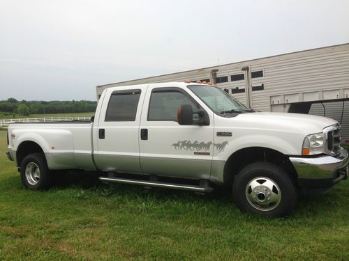 2004 turbo diesel 6.0 dually, 4 door crew cab, 4wd, 104,000 miles