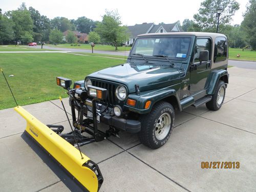 1999 jeep wrangler sahara - both tops - 6 cyl. 4.0 / 5 spd. 74,000     snow plow