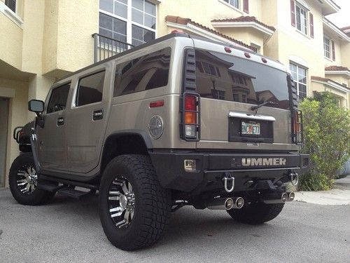 Hummer h2 low low low miles fully loaded new wheels and tires with 4 mufflers
