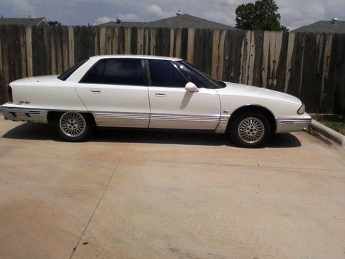 White 1992 oldsmobile 98 four door sedan regency