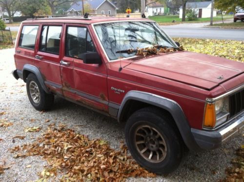 For sale red 1988 jeep cherokee larado 4.0l straight 6 4x4 4dr