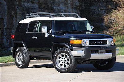 Toyota fj cruiser 4x4 6 speed manual, trd exhaust, upgraded wheels, pristine