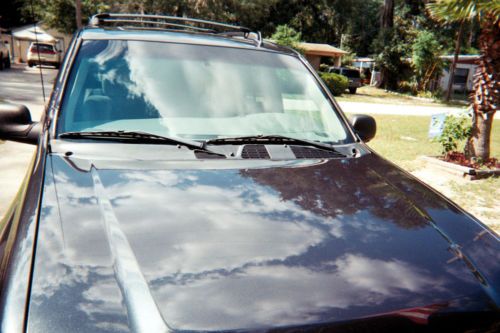 Dark gray ls model,on-star,xm capable,6 disc cd changer