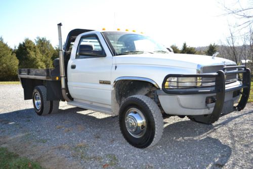 Dodge ram 3500 cummins turbo diesel with flatbed 4wd - no reserve
