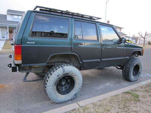 2000 lifted 4x4 jeep cherokee sport 4-door 4.0l lots of upgrades no reserve 33"