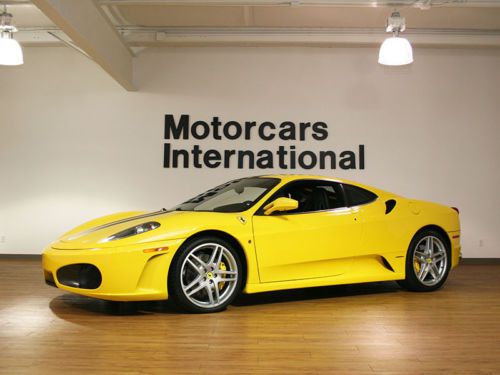 Low mile 2005 f430 coupe with racing seats and custom scuderia style stripe!