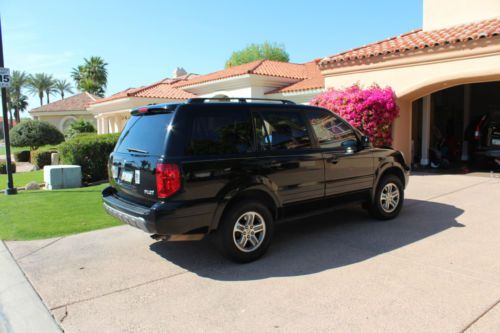 2004 honda pilot ex sport utility 4-door 3.5l, black, very good condition.