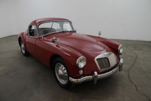 1961 mg a coupe, red, solid wheels, solid undercarriage, blue plate cali car