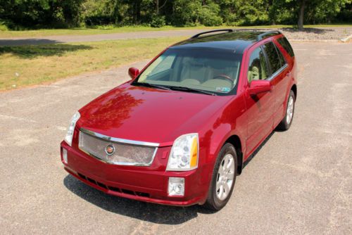 Gorgeous 06 srx awd navigation panoramic sunroof traction control clean carfax!