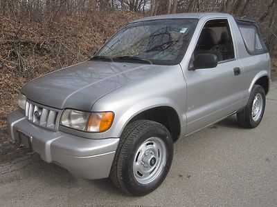 2002 kia sportage 2dr 5speed softtop 2ltr 4cyl gassaver w/air highbidwins