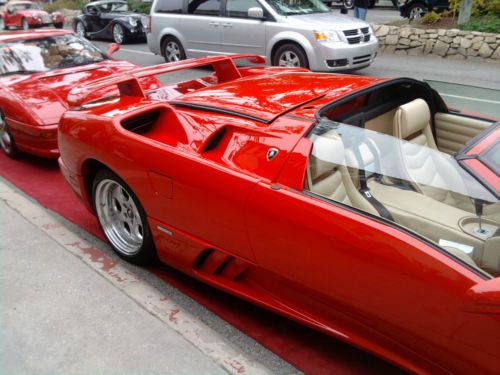 Roadster convertable red and tan interior 1998 almost new condition 2nd owner