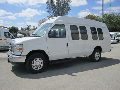 2010 ford e350 center aisle high top w/ rear luggage