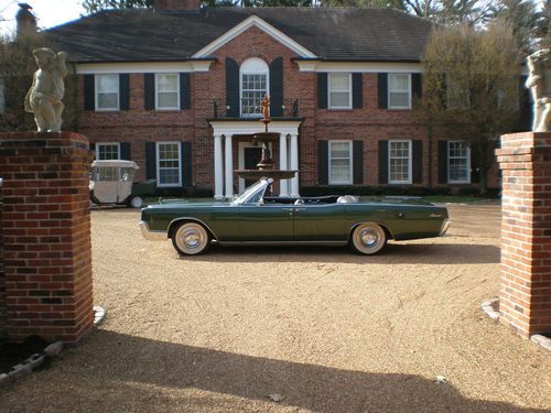 1966 lincoln continental convertible.new top, paint and interior.  low miles