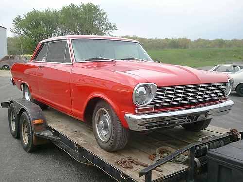 1964 nova ll 2 door coupe, new red metalic paint, fresh 350 motor.
