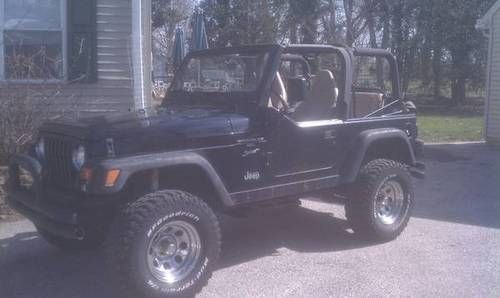 1999 jeep wrangler sport lifted, loaded and low miles