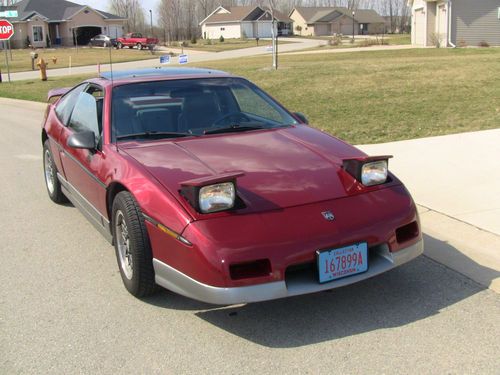 1987 pontiac fiero gt - $7000 obo.  3 speed auto trans. 57,000 miles, metal red