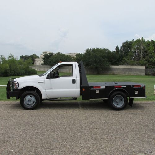 05 f350 reg cab xl drw 4x4 6.0l v8 p/s diesel 4x4 c&amp;m skirted flatbed auto