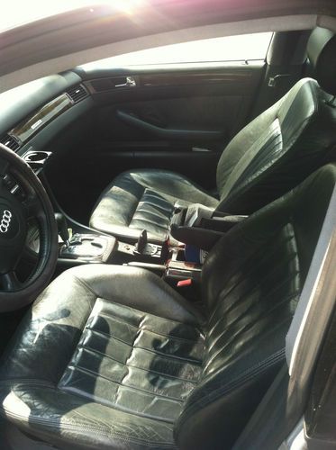 Black leather seats in excellent condition. car could be used for spare parts.