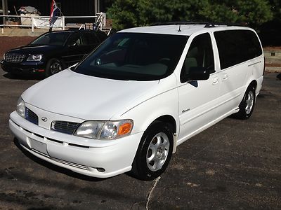 02 no reserve  quad seats leather 7 passenger 6 cylinder air conditioning fwd