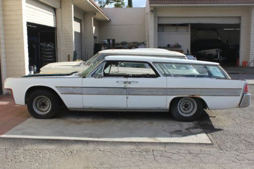 Two 1962 lincoln continentals