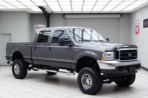 2002 ford f250 diesel 4x4 lariat dvd lifted leather 93k miles!