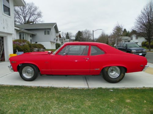 Red 2-door ss nova