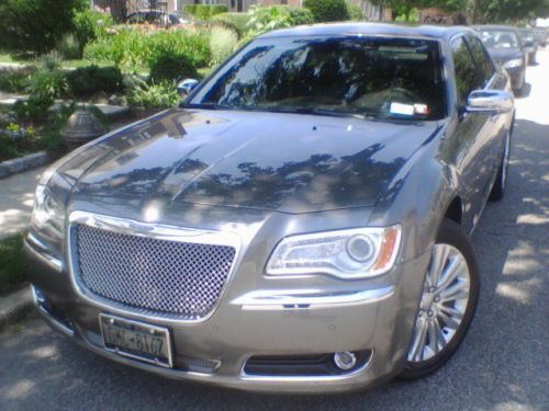 All wheel drive, v8 hemi engine, gun metal silver, black leather, navigation