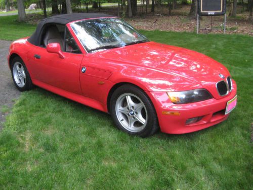Awesome 1998 bmw z3 2 door red convertible with tan leather interior.