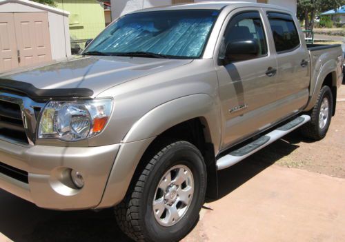 2008 toyota tacoma 4.0l v6, 4wd, 4 door double cab and desert color