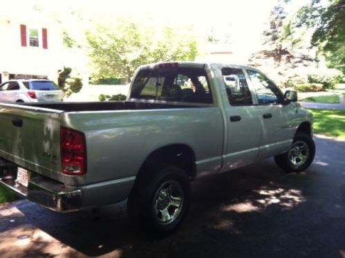 2003 dodge ram 1500 slt crew cab pick up, silver, 78093 miles, very good cond.