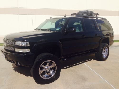 2005 chevy suburban z71 4x4 lifted roof quads dvd!!! only 69k!! big and bad!!!!