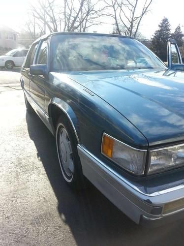 1993 cadillac deville touring sedan 4-door 4.9l