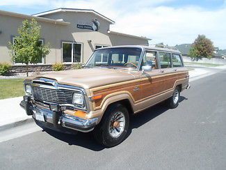 Tan wood paneling leather brown 5.9 liter v8 automatic am/fm/cassette 4wd