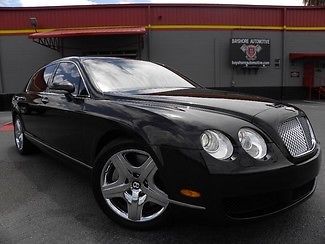 Flying spur*diamond black/porpoise/beluga hides*rear exec seating*we finance*fla