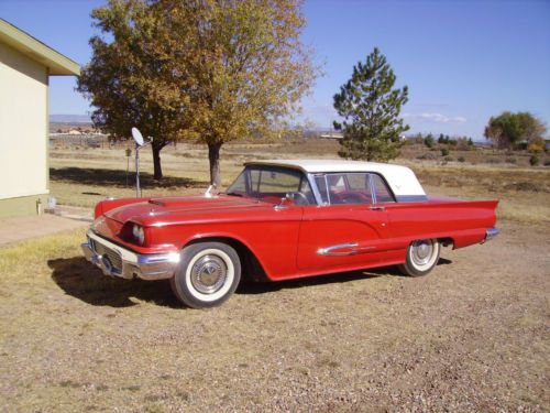 1959 thunderbird red and white, complete rebuild  two years ago
