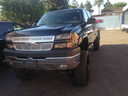 03 duramax 2500hd silverado with a 06 front end.